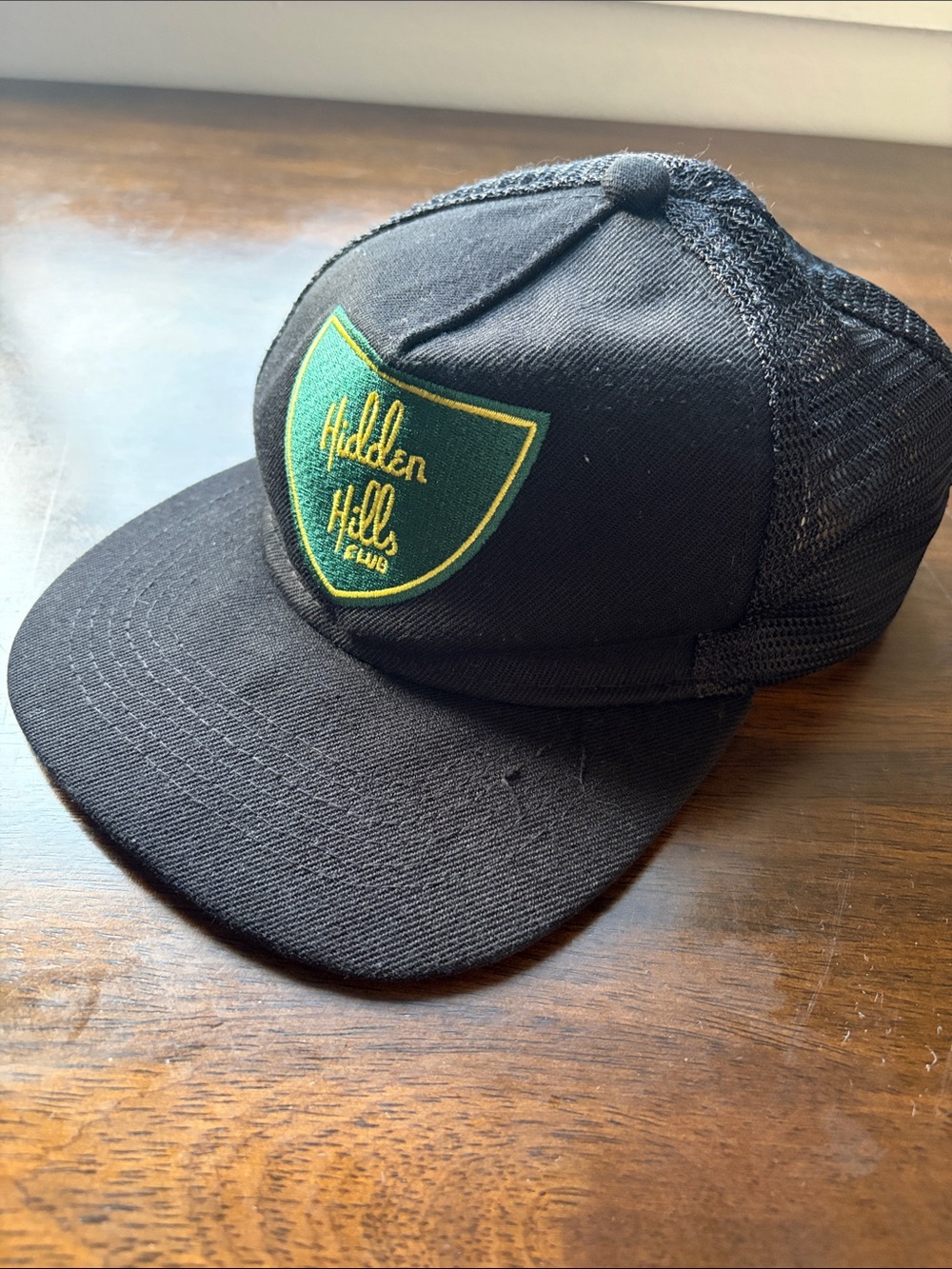 Black Mesh Trucker Cap with Green Hidden Hills Club Patch